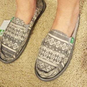 Sanuk slip ons